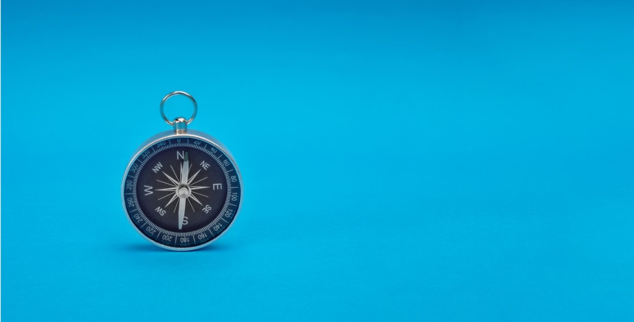 Compass on a blue background